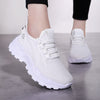 Xarien | Sneakers aus Mesh mit geformten weißen Sohlen